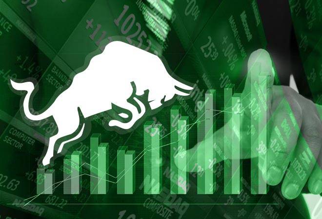 Sensex jumps 216 pts after exit polls give BJP an edge