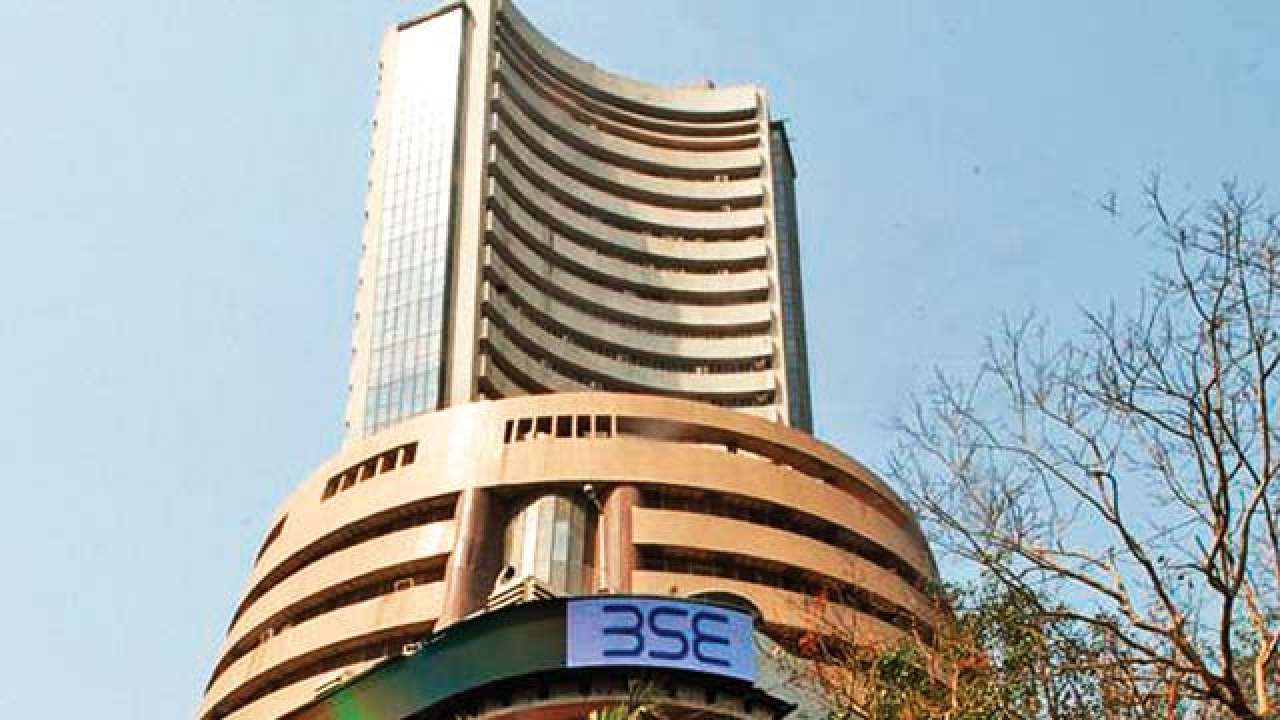 Sensex jumps 216 pts after exit polls give BJP an edge